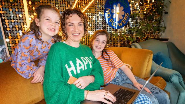 Natalie Jarvis and her children Matilda, 9, and Stella, 7, will shop online to score a bargain during Black Friday sales. Picture: Tony Gough