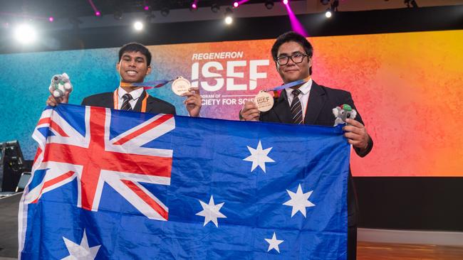 Darwin High School students Pothik Vincent Mondol (left), Monishi Rangchak Tripura (right), and Mohammad Niyaz Hasan (absent) came third in their category at the 2024 International Science and Engineering Fair in Los Angeles.