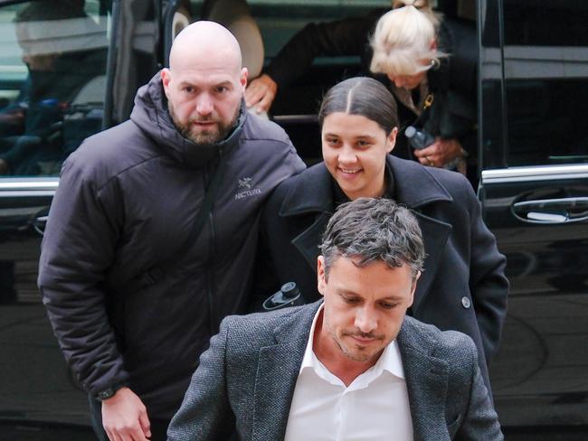 Matilda captain Sam Kerr arrives with her brother Levi and other family members, escorted by security into Kingston Crown Court on February 7, 2025. Picture: Jacquelin Magnay