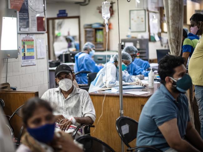 Medical staff attend to COVID-19 positive patients in the emergency ward at a hospital in New Delhi, India. Picture: Rebecca Conway/Getty Images