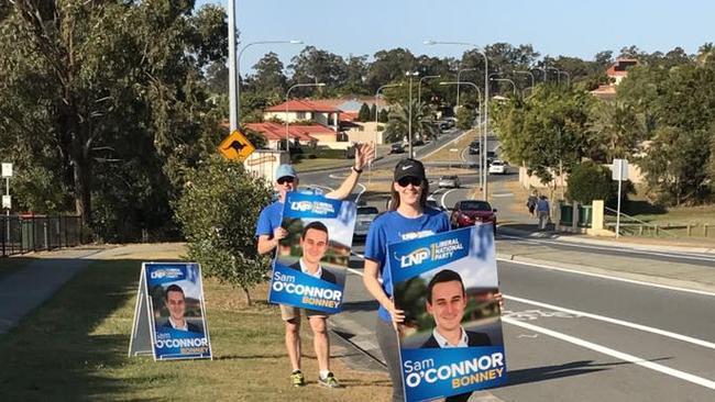 LNP Sam O'Connor's support team on Napper Road with placards on the weekend.