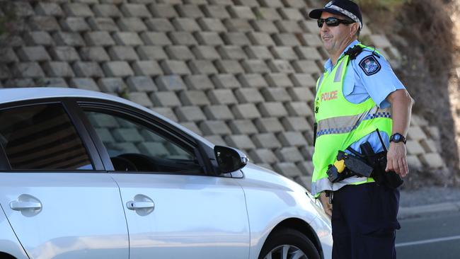 Police maintain the checks at the QLD/NSW border at Coolangatta Picture: Adam Head