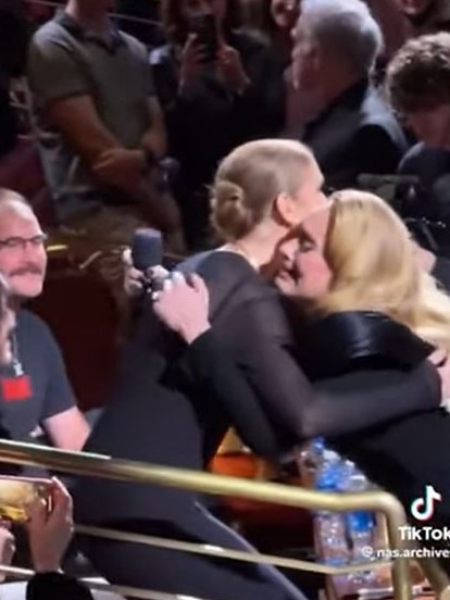 … a big hug before Adele continues the show. Picture: Tik Tok