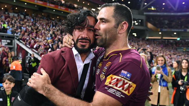 Cameron Smith (R) and Johnathan Thurston celebrate Queensland’s 2017 series win. Picture: AAP