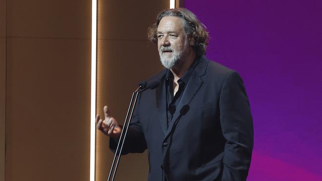 GOLD COAST, AUSTRALIA - FEBRUARY 07: Host Russell Crowe speaks during the 2025 AACTA Awards Presented By Foxtel Group at HOTA (Home of the Arts) on February 07, 2025 in Gold Coast, Australia. (Photo by Mackenzie Sweetnam/Getty Images)