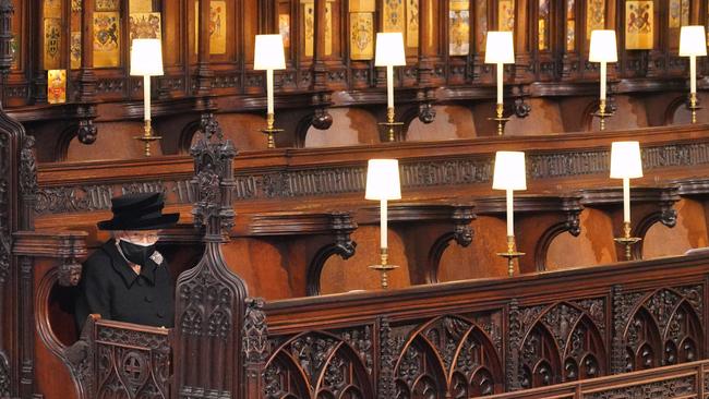 The Queen sat alone during the service. Picture: Jonathan Brady/Getty Images