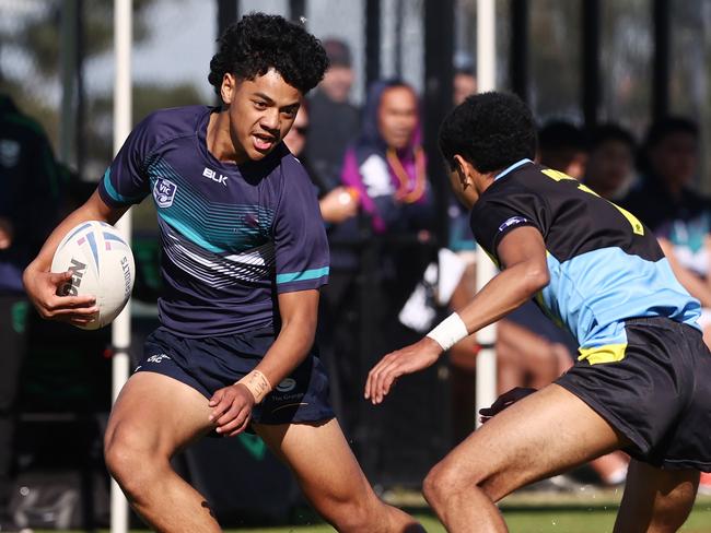 MELBOURNE. 11/05/2023.  Schoolboys Rugby League at Seabrook Reserve, Broadmeadows .  Mt Ridley v The Grange.  The Granges Zeph Faumuina tries to fend off  .Pic: Michael Klein