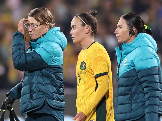 ADELAIDE, AUSTRALIA - MAY 31: Caitlin Foord of Australia is attended to by trainers after an injury during the international friendly match between Australia Matildas and China PR at Adelaide Oval on May 31, 2024 in Adelaide, Australia. (Photo by Cameron Spencer/Getty Images)