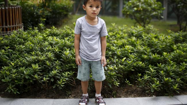 Qin Wuyue, who was born in 2010, poses for a photograph in Shanghai August 22, 2014. When asked if he would like to have siblings, Wuyue said: "No they're noisy." REUTERS/Carlos Barria/FilesPICTURE 7 OF 38 FOR FROM THE FILES STORY 'CHINA'S ONE CHILD POLICY'SEARCH 'BARRIA CHILD' FOR ALL PICTURES