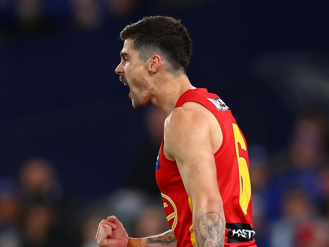 MELBOURNE, AUSTRALIA - AUGUST 20: Alex Sexton of the Suns celebrates kicking a goal during the round 23 AFL match between the North Melbourne Kangaroos and the Gold Coast Suns at Marvel Stadium on August 20, 2022 in Melbourne, Australia. (Photo by Graham Denholm/AFL Photos via Getty Images)