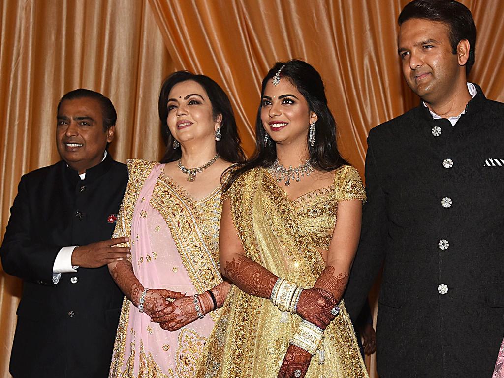 Indian businessman Mukesh Ambani with his wife Nita Ambani at their daughter’s wedding reception with Isha and Anand Piramal. Picture: Sujit Jaiswal