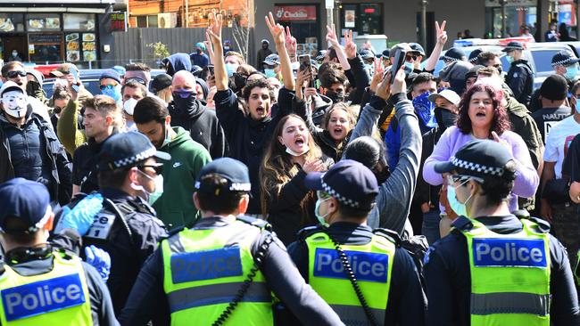 Anti-lockdown protesters at Melbourne's Queen Victoria Market in 2020. Picture: AFP