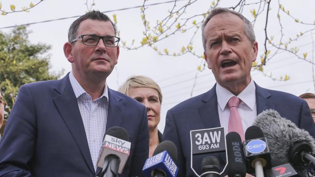 Opposition Leader Bill Shorten speaks to the media while Victorian Premier Daniel Andrews watches on during a press conference at Monash University in Melbourne, Thursday, October 4, 2018. Labor have made a major kindergarten funding announcement. (AAP Image/Wayne Taylor) NO ARCHIVING