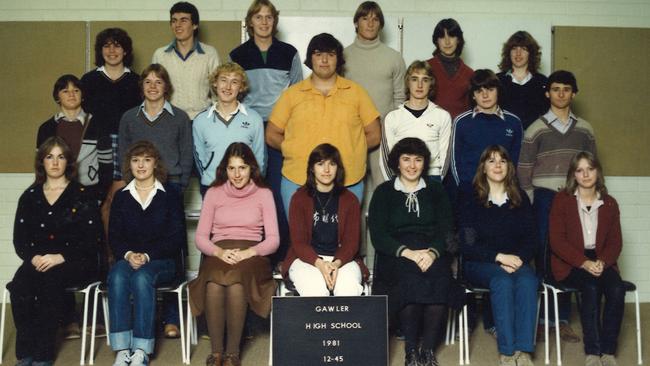 Unmissable in yellow, John Zisimou is pictured in a school photo at Gawler.