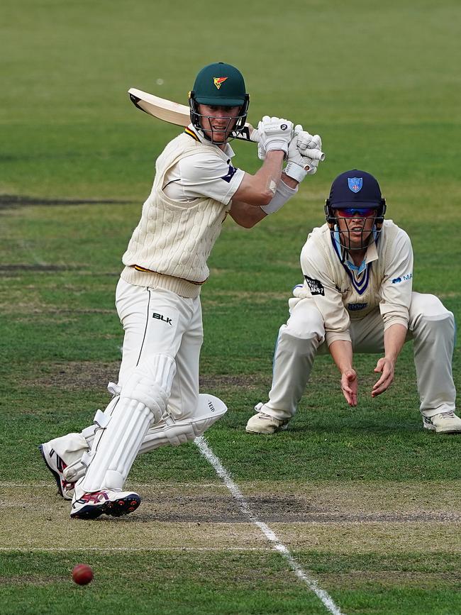 Tigers batsman Jordan Silk hits the winning runs on day 3 of the Marsh Sheffield Shield cricket match between the Tasmanian Tigers and the NSW Blues at Blundstone Arena in Hobart, Sunday, March 8, 2020. (AAP Image/Dave Hunt)