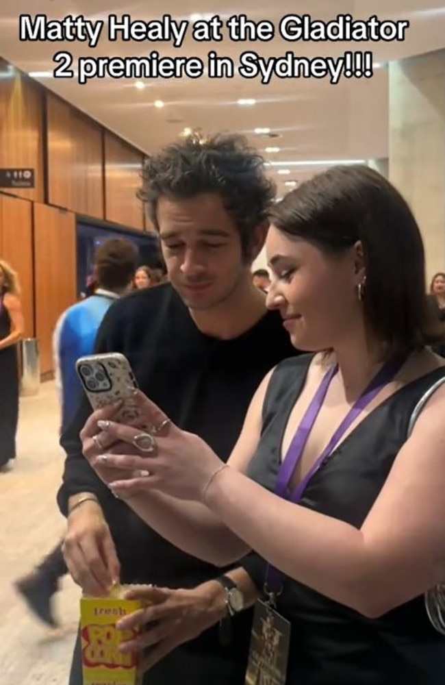 Healy was seen engaging with his fans and eating popcorn.