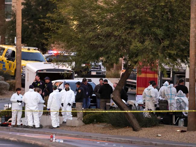 First responders investigate a Tesla Cybertruck that exploded in front of the Trump International Hotel’s entrance in Las Vegas. Picture: Getty Images via AFP