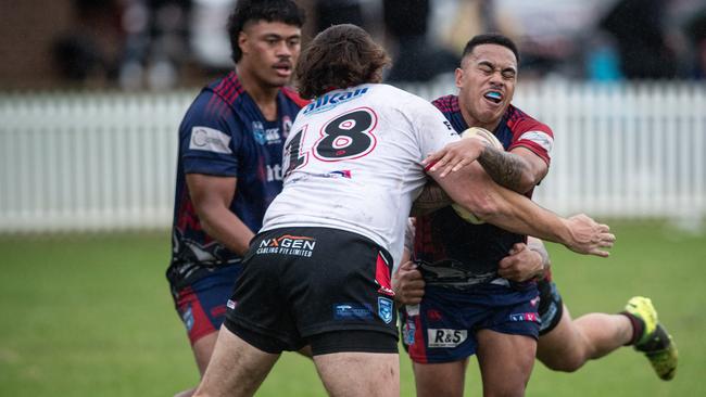 Collegians halfback Nautu’a Masima runs into Oakdale’s Nathan Davis. Pics by Julian Andrews.