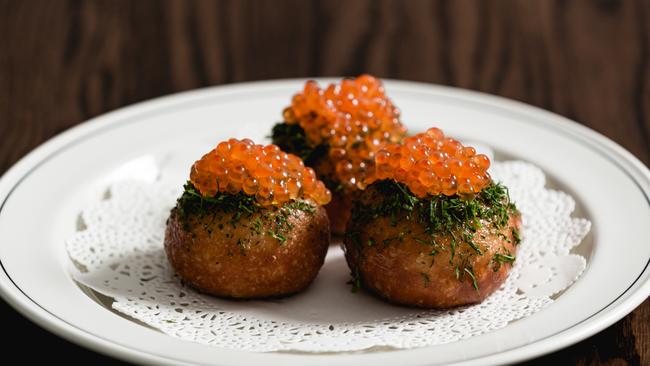 A new dish to the menu, fried buns stuffed with taramasalata and topped with caviar.