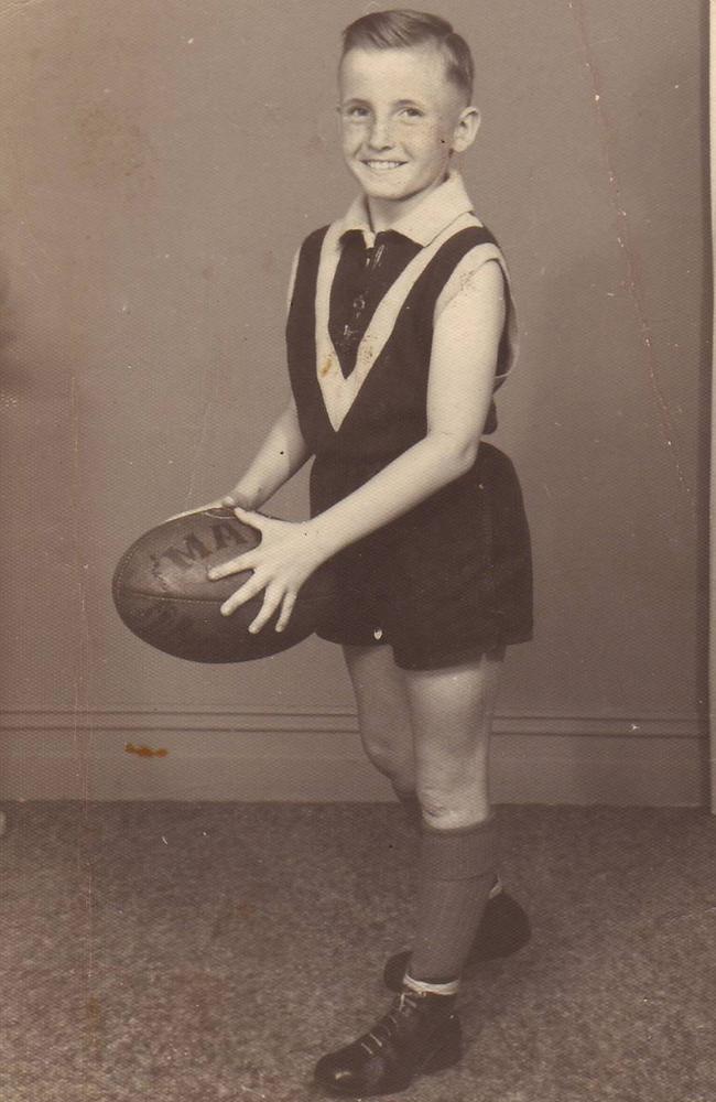 Always been a footy fan: Bruce McAvaney, aged 8. Picture: Supplied