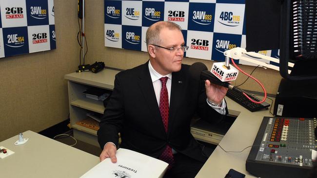 Denial  ... Scott Morrison prepares for  a radio interview at Parliament House this morning.
