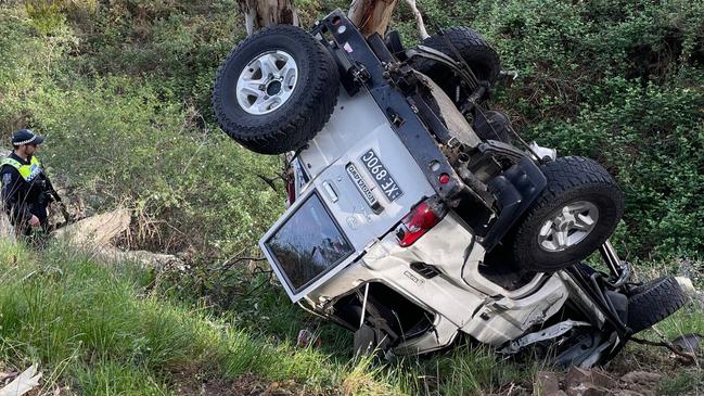 A Landcruiser and Holden Cruise have collided at Cut Hill , resulting in the Landcruiser's engine to detach and car into a tree down an embankment . The Cruise crashed into a wall . Picture: Gary Juleff