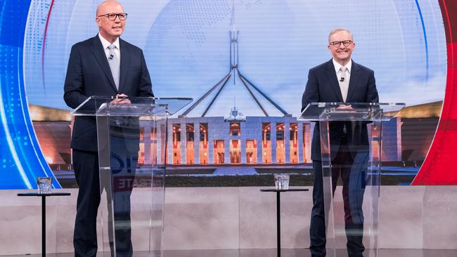 Anthony Albanese and Peter Dutton during the third debate on Tuesday night.  Picture: James Brickwood