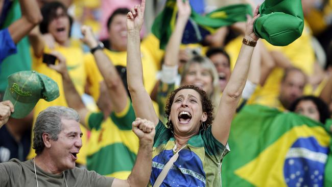 Brazilian fans go wild after the penalty shootout win.