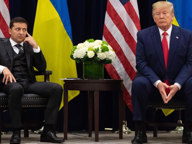 AFP presents a retrospective photo package of 60 pictures marking the 4-year presidency of President Trump.  US President Donald Trump and Ukrainian President Volodymyr Zelensky looks on during a meeting in New York on September 25, 2019, on the sidelines of the United Nations General Assembly. (Photo by SAUL LOEB / AFP)