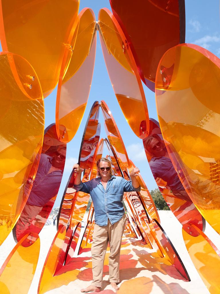 Swell Festival at Currumbin. Sculptor Clayton Blake with his work.Ã¢â&#130;¬Å&#147;SHIFAÃ¢â&#130;¬Â&#157; Picture Glenn Hampson