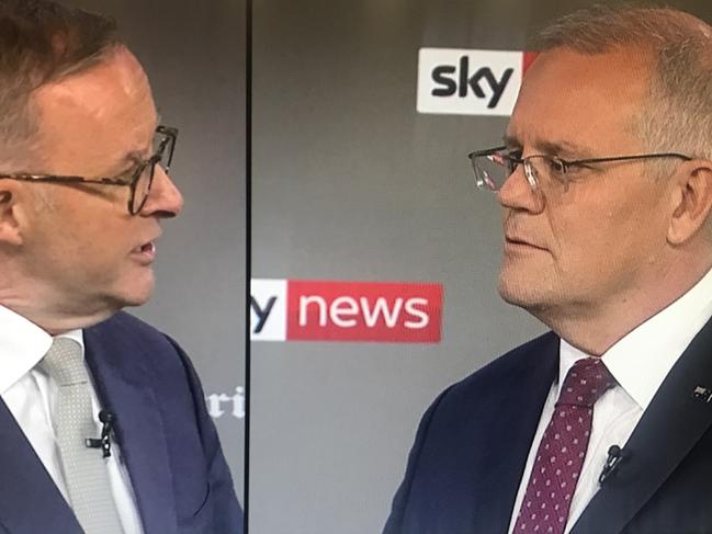 Moment ScoMo cuts in to grill Albo