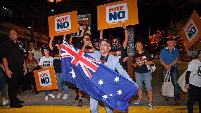 Police were forced to separate the Voice opponents as attendees of the No campaign event exited the venue. Picture: NCA NewsWire / John Gass