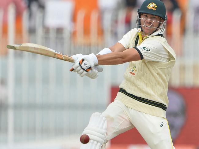 Australia's David Warner plays a shot during the first Test cricket match against Pakistan. He has vowed to be home for Shane Warne’s memorial. Picure: AFP