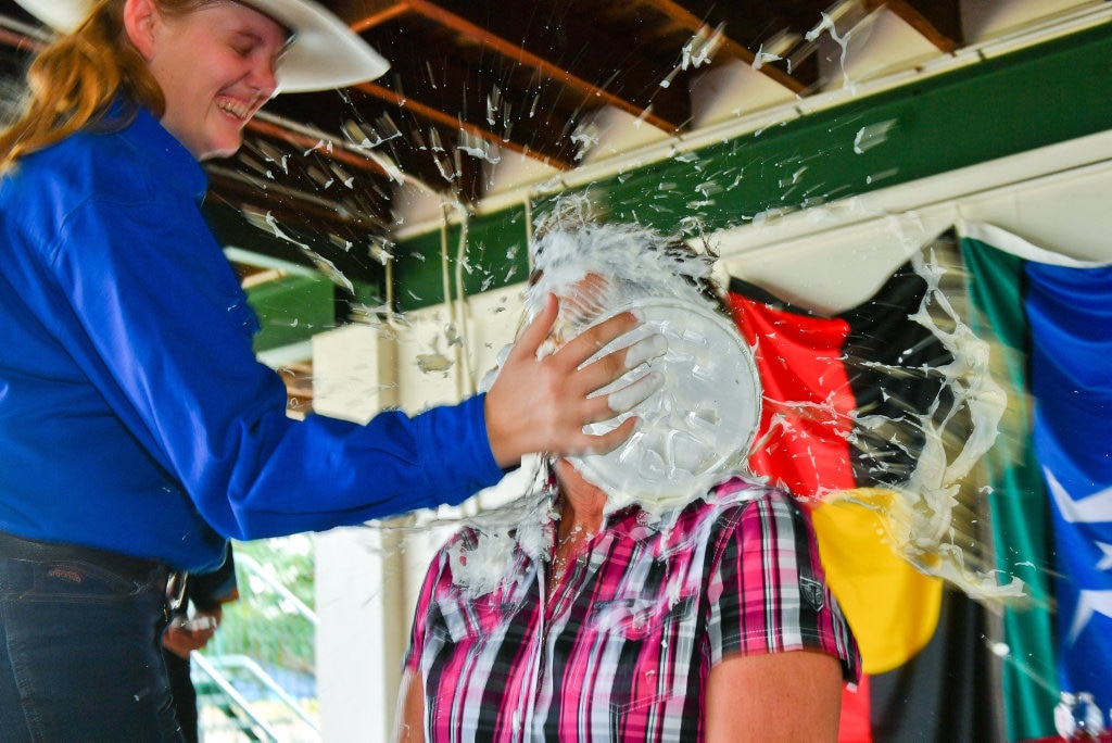 Year 10 student Georgia Douglas has been taught by Principal Pauline Porch since year 3,so she was really pleased when her name was pulled out if the box.PIE IN THE FACE - Mt Larcom State School raises money for drought relief. Picture: Mike Richards GLA140918PIEF