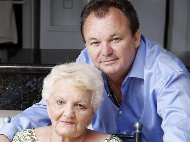 Local identity Peter Foster with his mother Louise Foster at his Carrara home talking about the trouble and strife he has gotten himself into in recent times.