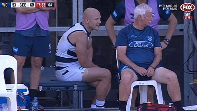 Gary Ablett on the bench after suffering a hamstring injury.