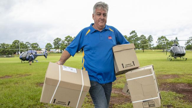 Michael Daniel carries good flown in for Lismore Chemist Warehouse. Picture: Media-Mode