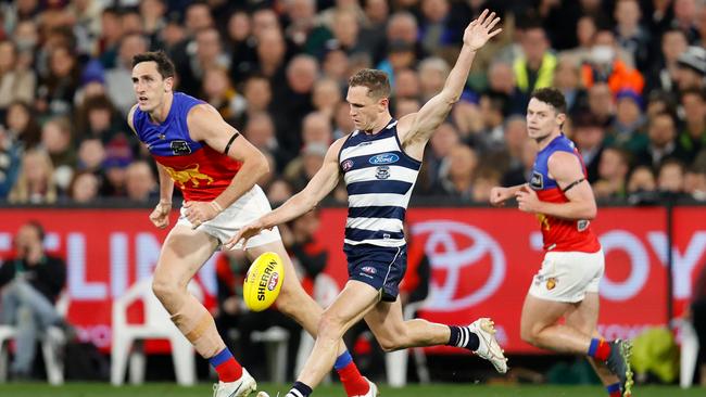 Skipper Joel Selwood launches Geelong forward.