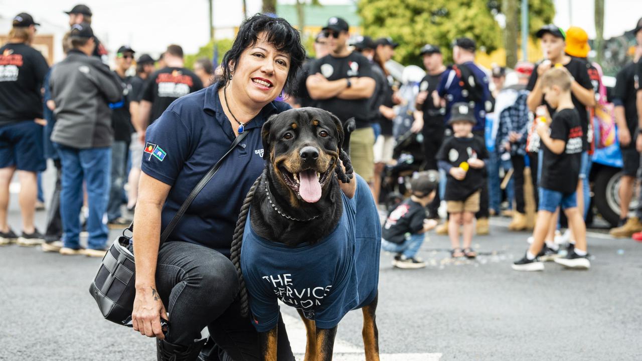 Claudia Reyes and her rottweiler Logan show support for The Services Union at the Labour Day 2022 Toowoomba march, Saturday, April 30, 2022. Picture: Kevin Farmer