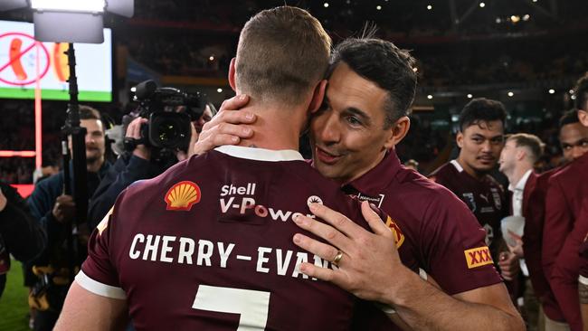 Coach Billy Slater celebrates with Daly Cherry-Evans after clinching the Origin series. Picture: Bradley Kanaris/Getty Images