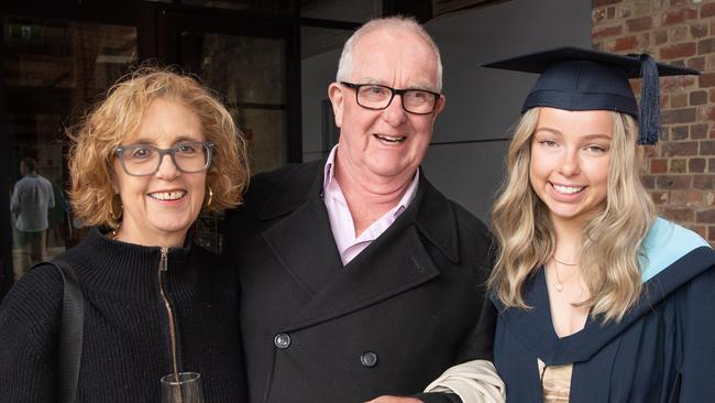 Trish, Chris and Erin Stewart celebrate graduation. Picture: Brad Fleet
