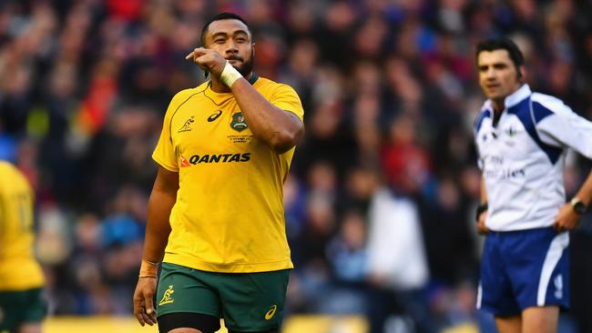 Sekope Kepu leaves the Murrayfield pitch after being issued with a red card.