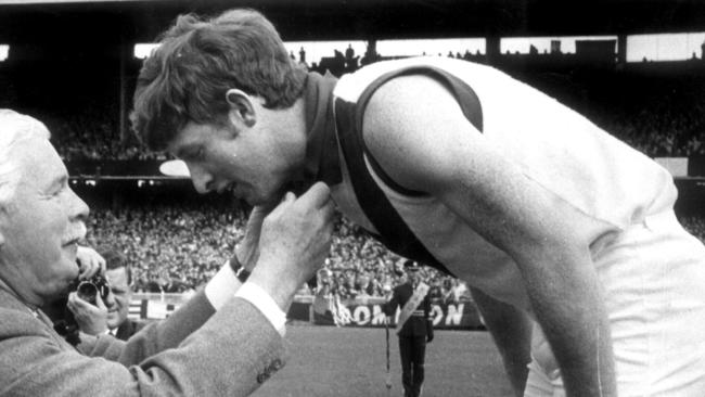 Brownlow boy: Peter Bedford accepts the medal in 1970.