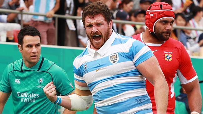 Argentina hooker Julian Montoya celebrates scoring his side’s first try against Tonga. Picture: Getty Images