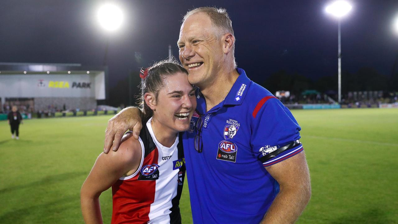 A photo for a generation: Bulldogs head coach Nathan Burke with Saints young gun and daughter Alice Burke after St Kilda’s win. Picture: Michael Willson