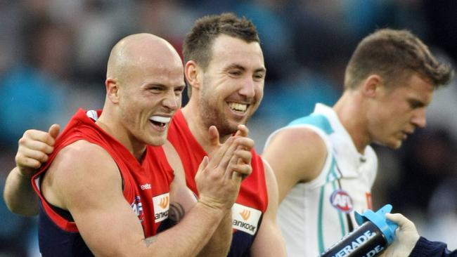 Nathan Jones and Brock McLean enjoy the win over Port. 