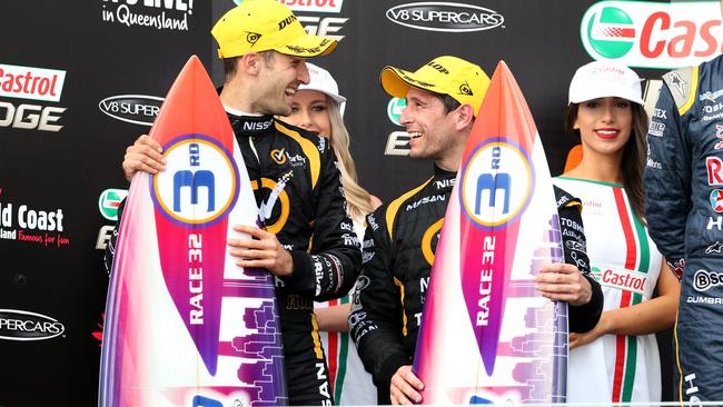 A very happy Dean Fiore and Michael Caruso collect third on the podium at the Gold Coast 600. Pics Adam Head