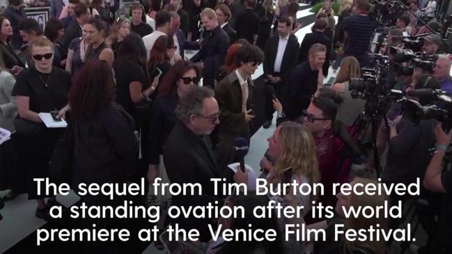 Stars of Beetlejuice Beetlejuice walk the black and white carpet at UK premiere