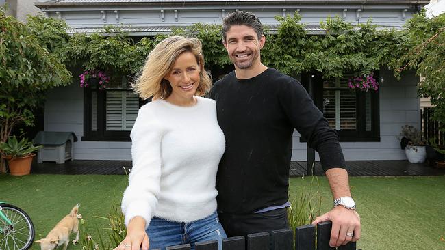 Former Collingwood footballer Brodie Holland and his wife Sarita. Picture: Ian Currie