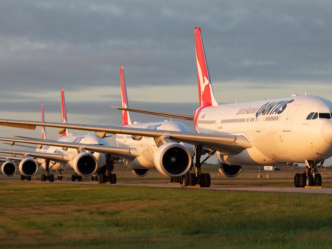 A row of four Qantas A330's sit grounded at Avalon air base as the airline massively scales-down its operations due to COVID-19 disruption. PIC: Chung Choo